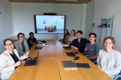 Before leaving, the group met to plan the logistics of attending such a large event – travel, accommodation and presentation times.