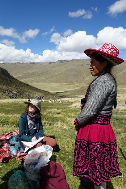 Annina listens to the translator while interviewing a female Alpaca farmer. Annina said the visuals from her interviews were as memorable as the discussions.