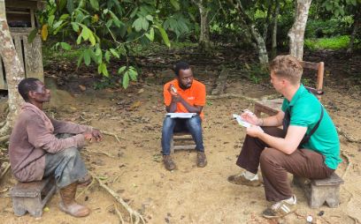 Paul interviewing farmers in Ghana.